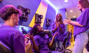 gamers-celebrating-victory-in-internet-cafe-with-n-2025-02-22-01-11-37-utc.jpg